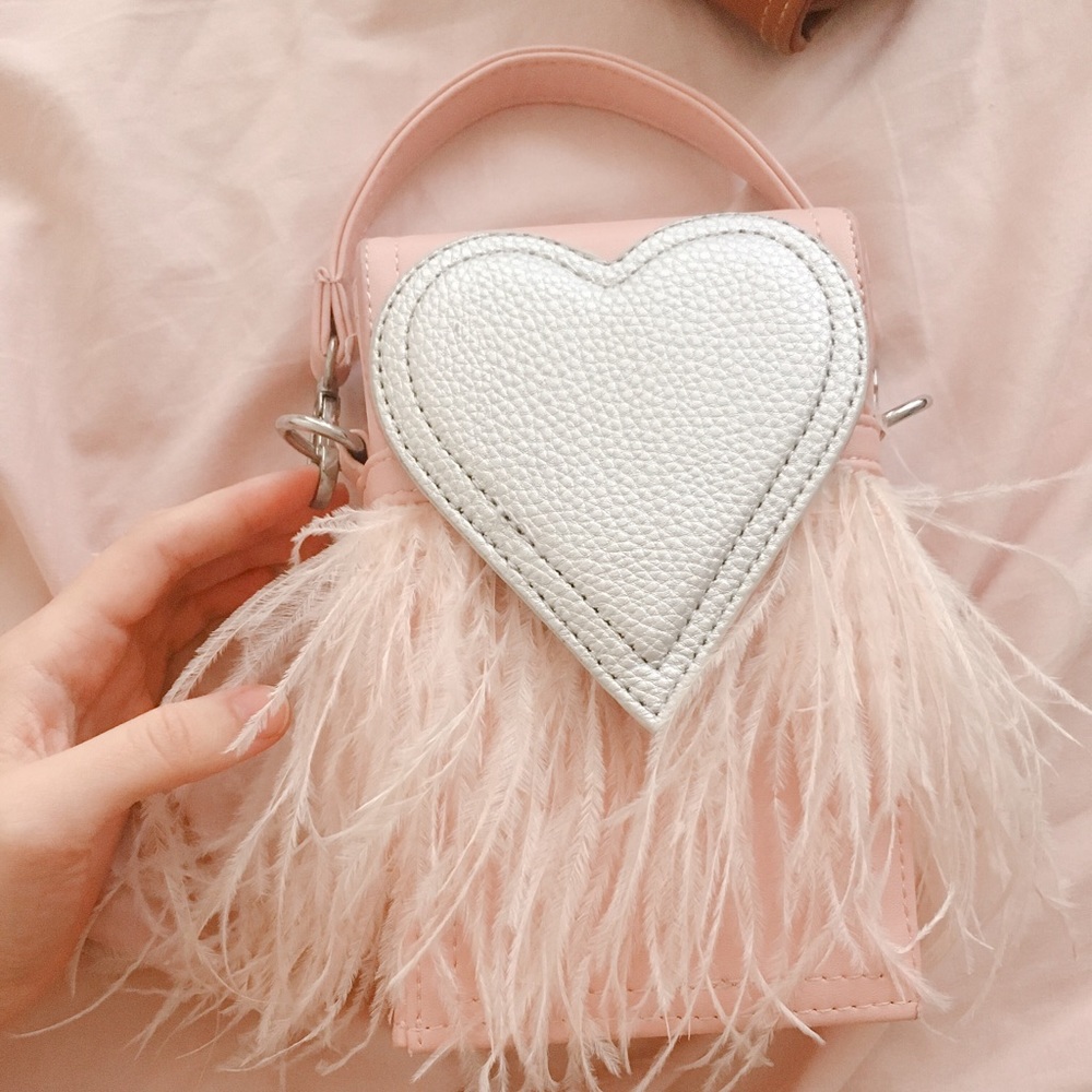Pink and grey feathered purse